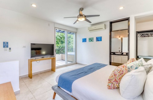 Playa del Carmen Villa | Luxurious villa with partial AC, strong WiFi, pool, gym, event hall & garden