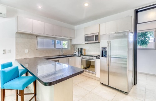 Playa del Carmen Villa | Luxurious villa with partial AC, strong WiFi, pool, gym, event hall & garden