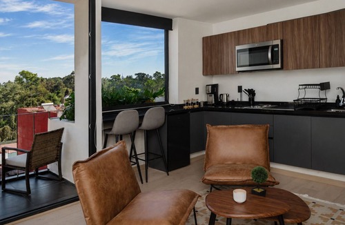 Roma Sur Apartment | Luxury and comfort in the heart of Roma Sur. Modern loft with king-size bed, Smart TV, fast WiFi, beautiful balcony and fully equipped kitchen. Perfect for professionals and travelers seeking for a great experience.