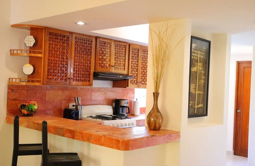 Playacar Condo | Luxury Condo Close to the beach,Tropical Setting,Garden Patio, Golf Club Nearby