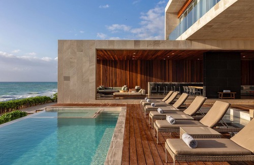 Centro Villa | Modern 7 bed, beachfront masterpiece close to town!