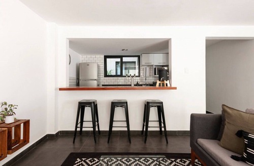 Hipodromo Apartment | Modern, Industrial Apartment with Bamboo Garden and Rooftop Terrace