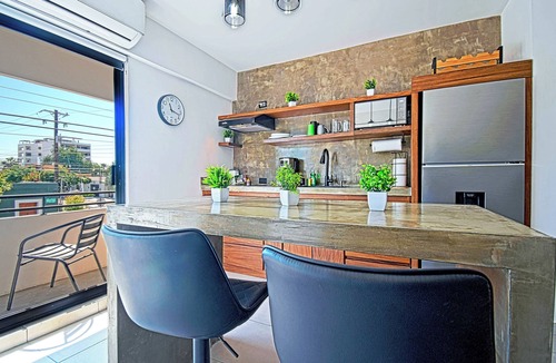 La Paz Apartment | New apartment with communal pool, steps from beach
