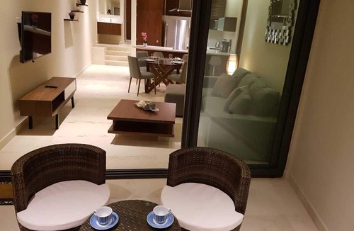 Downtown Apartment | New condo in best building Playa, 1 block from beach, amazing rooftop pool