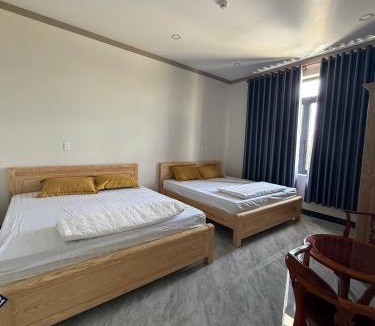 Tan Uyen Town Hotel | Nhà Nghỉ Hoa Mai