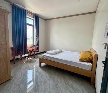 Tan Uyen Town Hotel | Nhà Nghỉ Hoa Mai