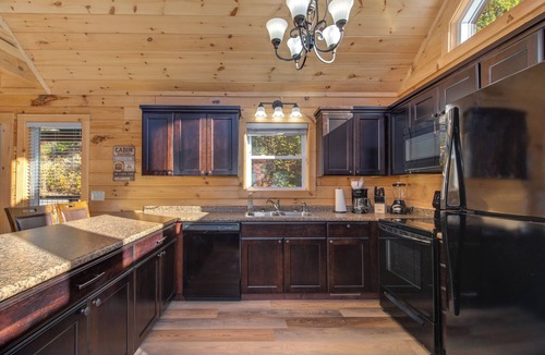 Gatlinburg Cabin | Overlooking Adventure by Jackson Mountain Rentals