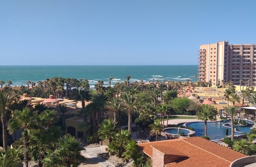 Sandy Beach Condo | Relax in 2-bed/2-bath Condo; Luxurious Patio Overlooking Plush Resort and Ocean