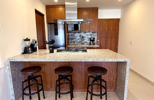 Libertad Apartment | Rooftop BBQ, Pool Access, Gym & Sunset Views