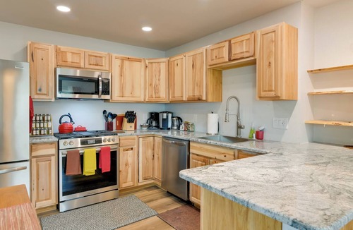 University Area Apartment | Shared Yard + Fire Pit: Airy Anchorage Apt!