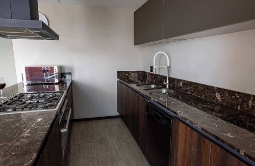Zona Minerva Apartment | Skyline View Patio & Pool Access in Jalisco