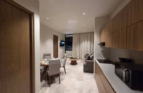Colonia 10 De Abril Condo | Sleek New Condo with Island Charm in Cozumel