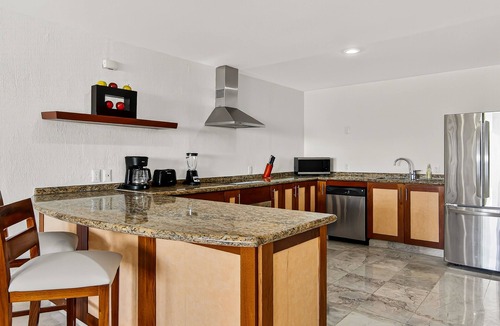 Conchas Chinas Apartment | Spacious oceanview suite with heated pool, hot tub & terraces for lounging