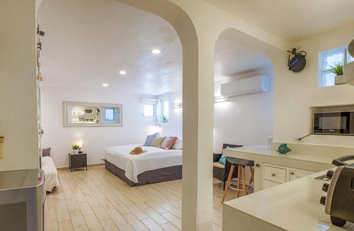 Akumal Condo | Steps to the sea! Charming garden view studio with beach access, WiFi and AC.