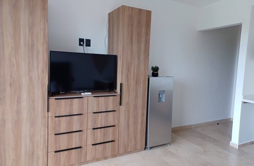 Ejidal Apartment | Studio in Centro Maya area of Playa Del Carmen-full kitchen, AC, smart TV, pool.