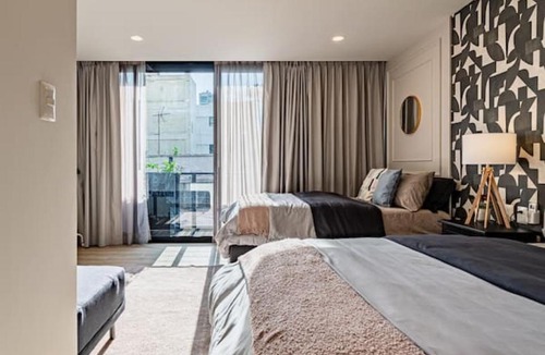 Roma Sur House | Stylish Roma Sur Home with Rooftop Lounge & BBQ
