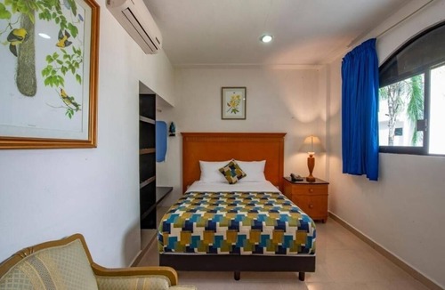 Centro Hotel | Sun-Soaked Mérida Single Room Stay: Outdoor Pool, Courtyard & Relaxing Comfort