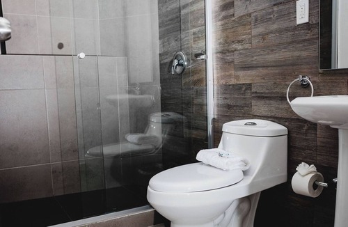 Centro Hotel | Three Modern and Vibrant Rooms Just Minutes from Attractions, Shops, and Dining