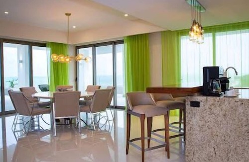 Punta Sam Condo | Unwind in Opulent All-Inclusive Resorts: Modern Elegance in Cancun Mexico
