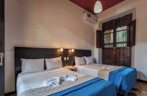 Centro Hotel | Vibrant Three Room Retreat Steps from Downtown’s Culture, Dining & Nightlife