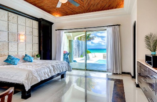 Playacar Beach Villa | Villa El Dorado is a chic contemporary oceanfront private oasis