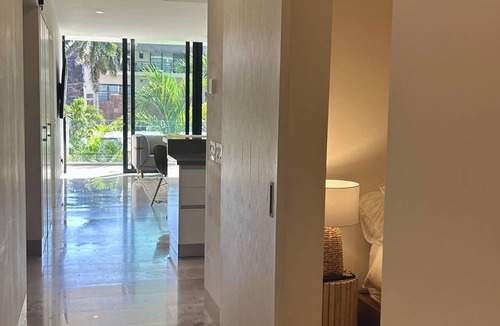 Downtown Condo | VOTED MOST LUXURIOUS! MODERN 3 Bedroom 100 steps to White Sand & Turquoise Water