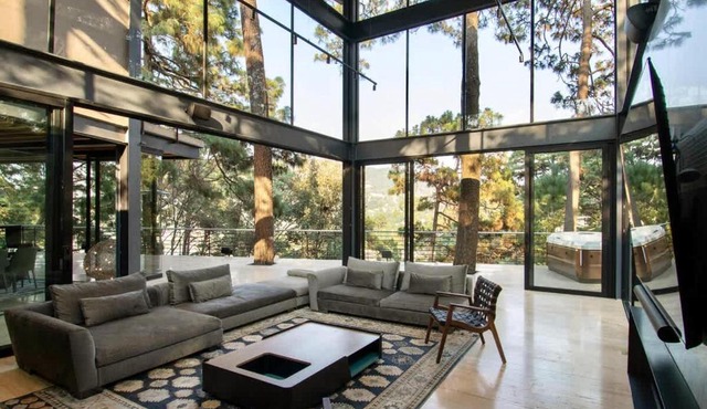 Architectural glass masterpiece villa in Avandaro Forest