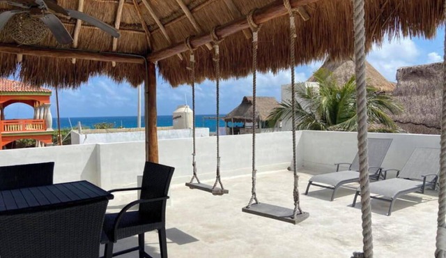 Beach View Palapa with 2 Bedroom Penthouse Across from Isla Village