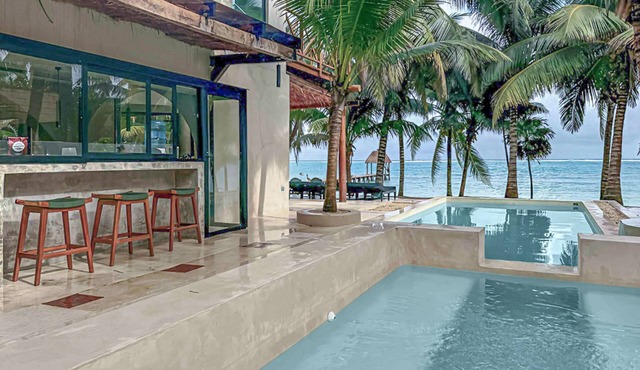 Beachfront home with private heated pool, jacuzzi, sauna, ocean views & AC