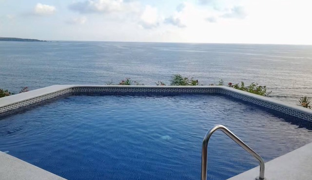 Beautiful condo #19 with 2 pools, one by the sea