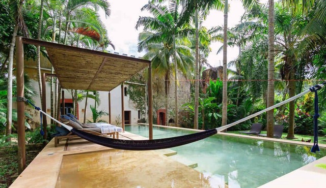 Beautiful Six Bedroom Tucked Away on the Lush Grounds