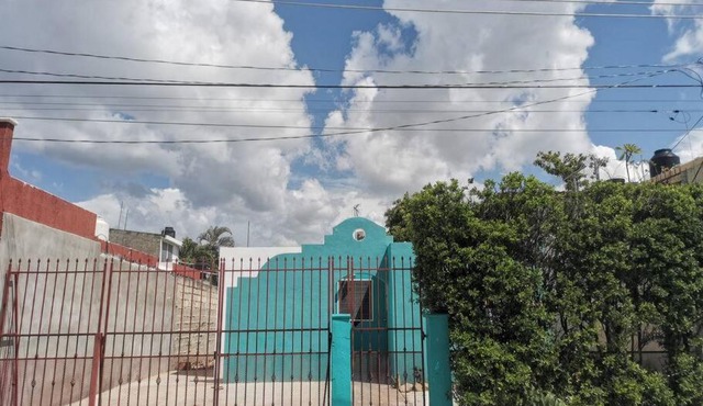 Casa Turquesa enfrente de parque