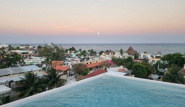 Central 4-bedroom, 3 bath Condo with WiFi, AC in fantastic Puerto Morelos