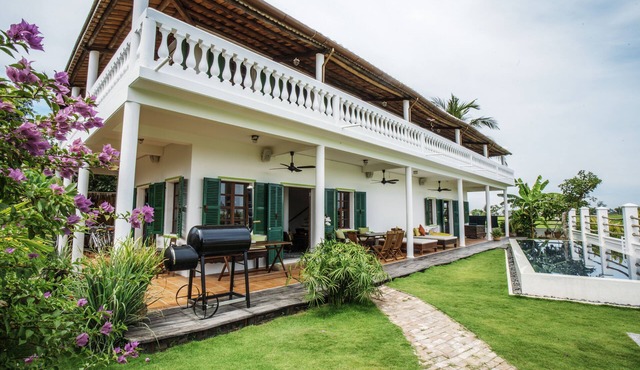 Chic French Colonial Villa in the rice fields