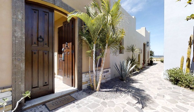 Coastal retreat with sweeping ocean views, a huge patio, AC, WiFi & shared pool