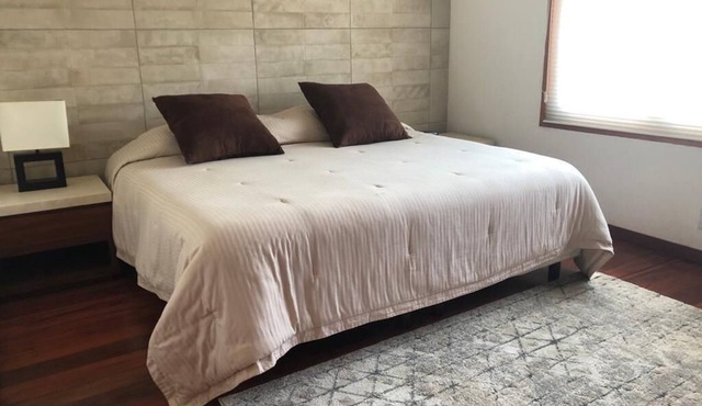 Comfortable Bedroom 2, King size bed, closet, private bathroom and Smart TV 50"