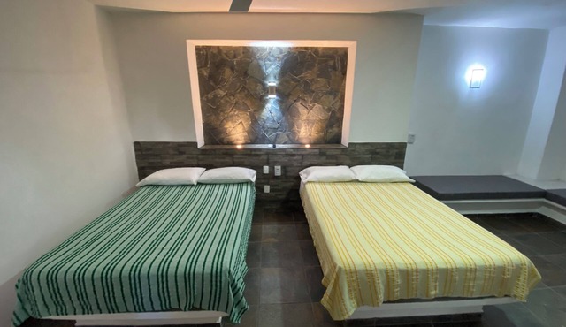 Costa Ayala suite 2 with 2 dbl bed and 3 sofas, all basics, 2 blocks from beach
