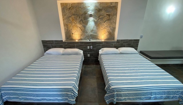 Costa Ayala - Suite 6 with kitchen 2dbl beds and 2 sofas. Near beach area.