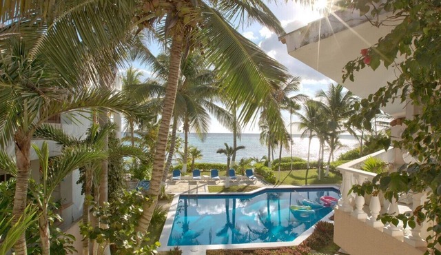 Enjoy the ambience of this beachfront condo located in South Akumal!