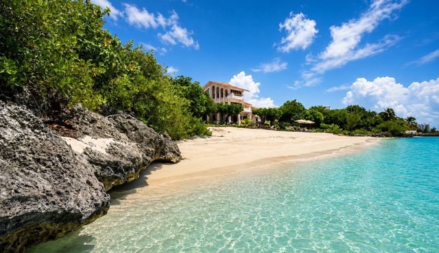Enjoy your own private beach in this Amazing Luxury Beachfront property!