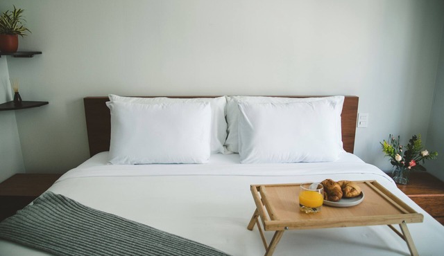 Fully equipped kitchen, high-speed internet, comfy king-size and 2 twin beds, and two TVs, Located just a 3-minute walk from the new U.S. Embassy.