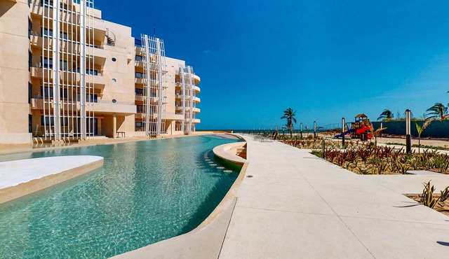 Gulf-view getaway with a furnished terrace, pool, & easy beach access