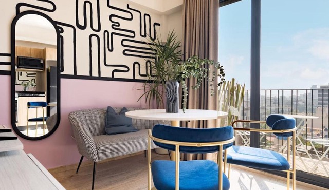 Loft de diseno con aire acondicionado y cama king size