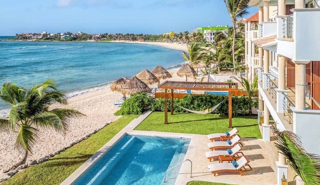 Luxurious and elegant beachfront villa with a heated pool!