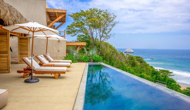 Luxury home with pool and breathtaking views just a few steps from the beach