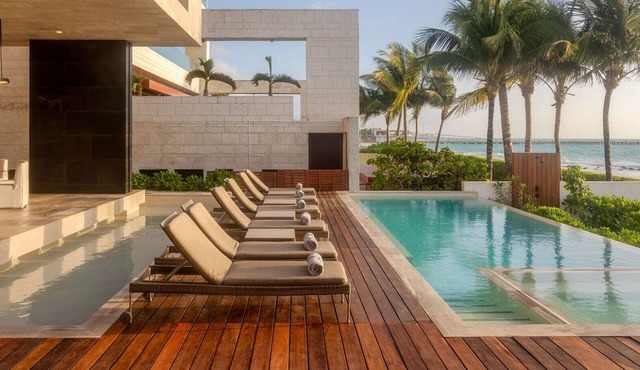 Modern 7 bed, beachfront masterpiece close to town!