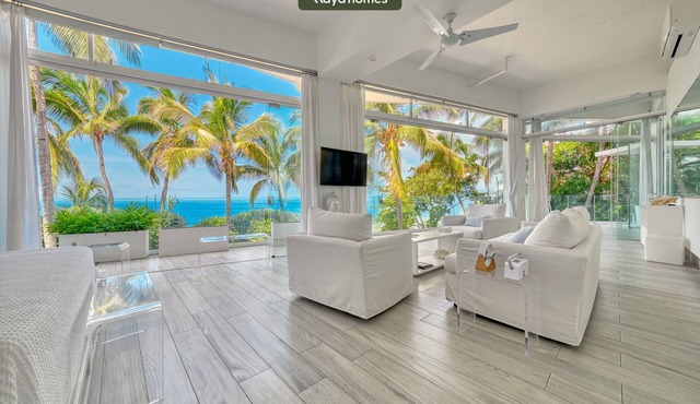 Ocean Front 3 Bedroom/3 bath modern condo with huge floor to glass doors