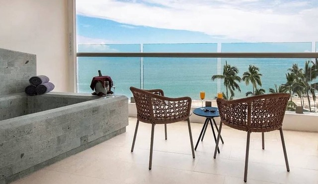 Ocean View in a Beach Front Resort and Spa. (Incl. All-Inclusive for 2 Adults)