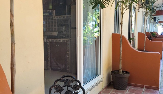 One bedroom tiny condo PB1 with huge pool! Extended stays get discounted rates!