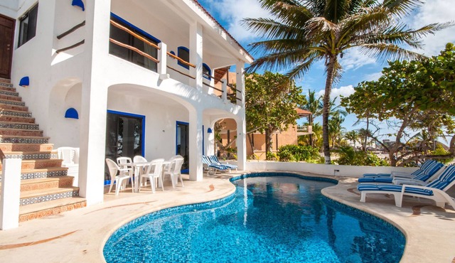 Perfect for a large group! Beachfront 7 bedroom villa with pool, AC and WiFi!